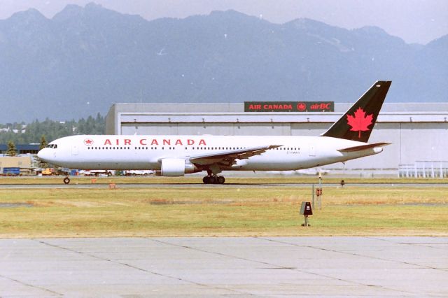 BOEING 767-300 (C-FMWY) - CYVR - Air Canada 767-3 departing Vancouver about noon. CN: 25587 LN:604 photo date apprx Aug 1997-98. Now in Air Canada Rouge colors.