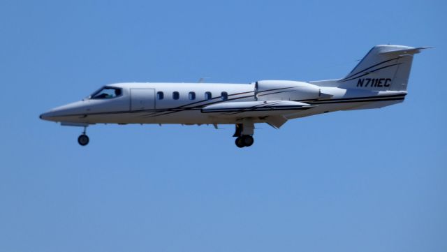Learjet 35 (N711EC) - On final is this 1980 Gates Learjet 35A in the Spring of 2019.