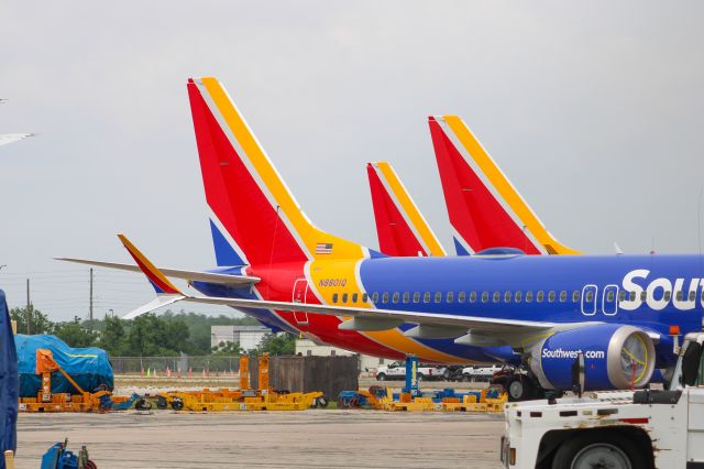 N880IQ — - 3 Southwest 737-Max 8's sitting by the Southwest hangar at MCO.