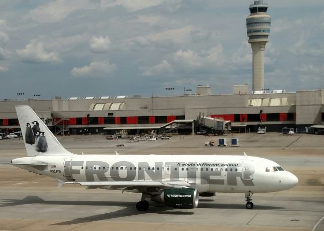 Airbus A319 (N939FR) - View from Buffalo Wild Wings restaurant in concourse D at ATL - 9/1/16