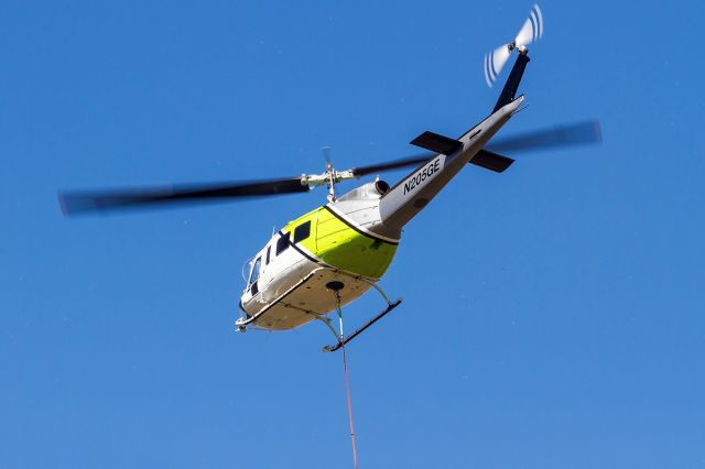 Bell UH-1V Iroquois (N205GE) - AV8-ORR Bell UH-1H Iroquois departing from the Idaho County Airport in Grangeville to tackle a fire.