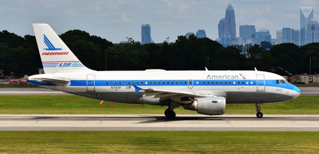 Airbus A319 (N744P) - My favorite retrojet, from the CLT overlook, 6/8/19.