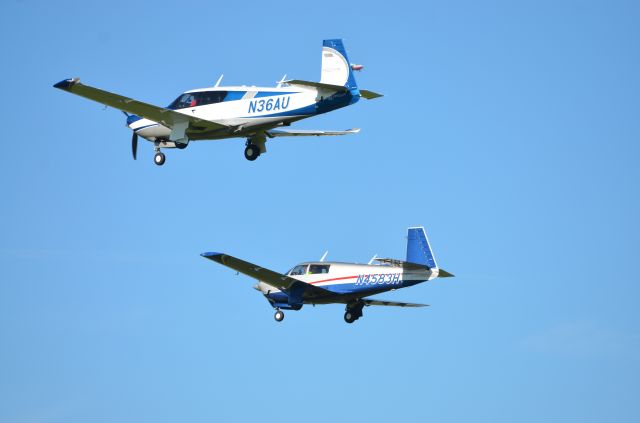 Mooney M-20 Turbo (N36AU) - Final approach to runway 36 at Airventure 2018.