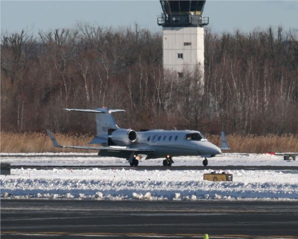Learjet 31 (N115BX)