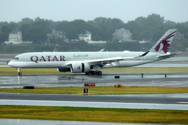 Airbus A350-900 (A7-ALN) - QR 743 taxiing in on 33L