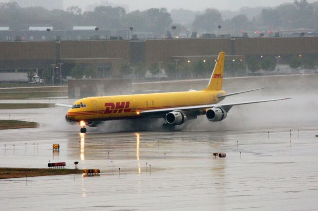 — — - DHL cargo landing on 12R