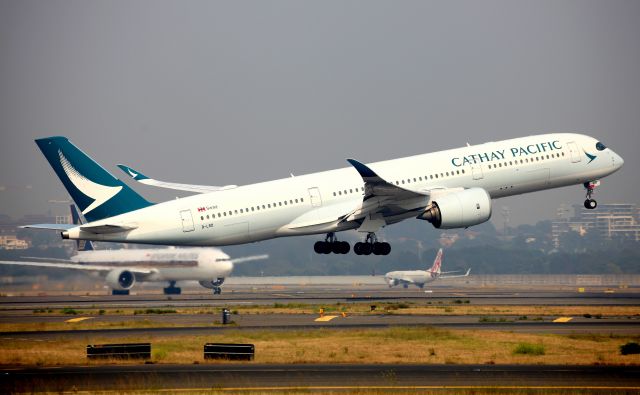 Airbus A350-900 (B-LRD) - Lifting Off from Rwy 34L Amidst Bush Fire Smoke