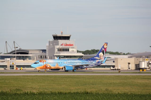 C-GWSV — - westjet flight 735,departing CYXU,London,Ontario,Canada,onroute to Calgary,seen in Disney Livery,June 13,2016