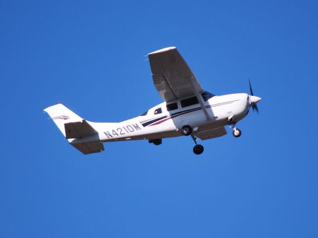 Cessna 206 Stationair (N4210M) - OMEGA AIR departing runway 2 at KJQF - 3/20/14