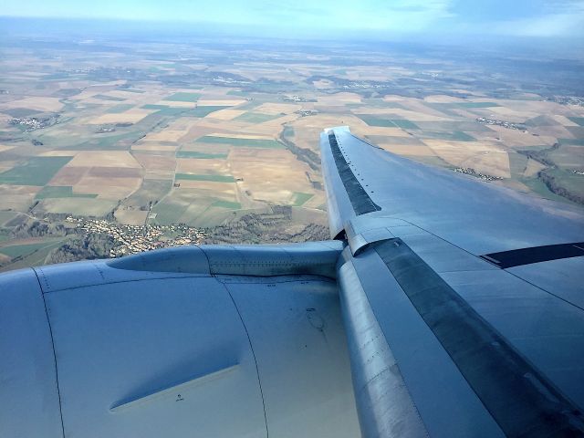 — — - Inflight over France