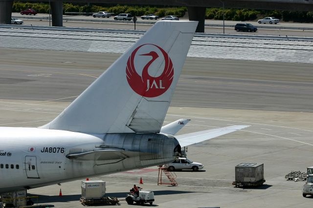 Boeing 747-400 (JA8076) - KSFO - JAL 747 at the Intl Dock being readied for the return trip to Haneda. 4-1-2005.