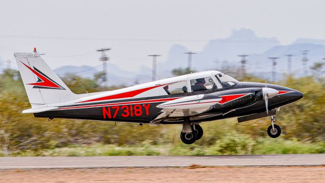 Piper PA-30 Twin Comanche (N7318Y) - Piper PA-30 Twin Comanche departs Buckeye Municipal Airport, February 2023