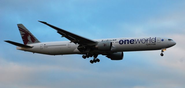 Boeing 777-200 (A7-BAG) - Taken from T5 landing on 09L