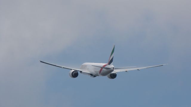 Boeing 777-200 (A6-EFK) - Takes off for a delivery flight from Everett to HK