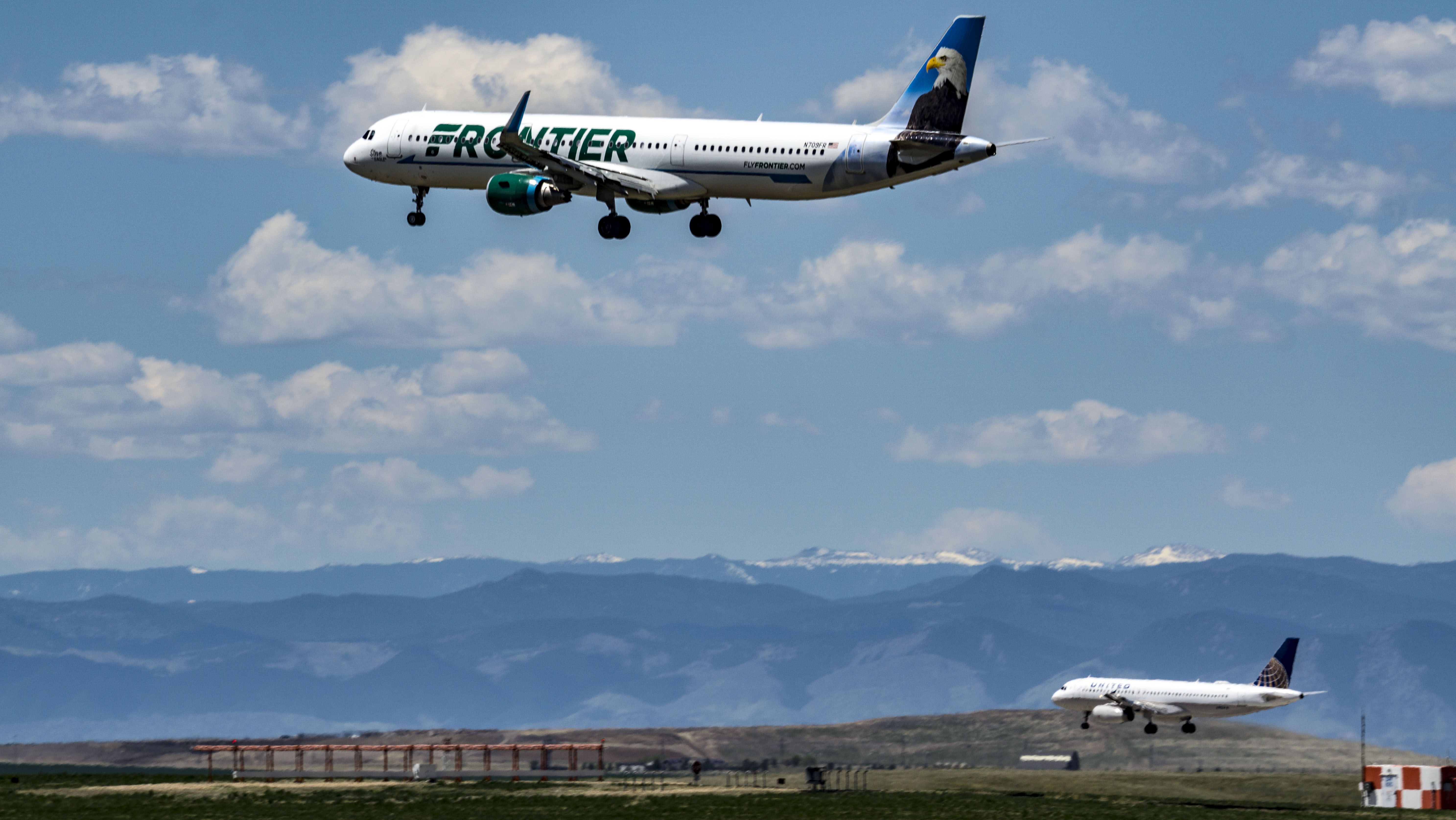 Airbus A321 (N709FR) - Steve the Eagle on short final for 16L with a United A320 landing 16Rbr /5/13/17