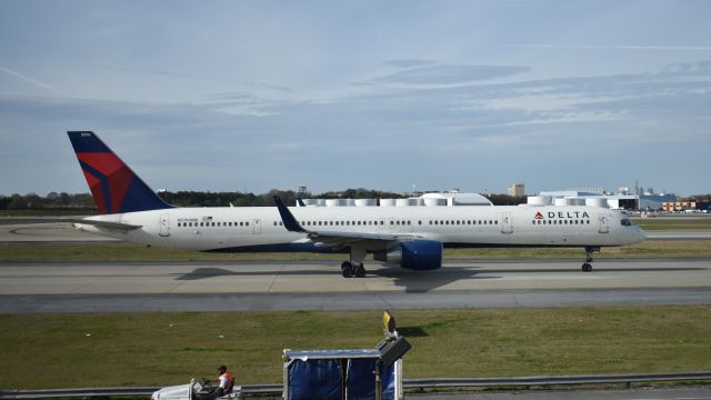 BOEING 757-300 (N596NW) - Taxiing past Concourse B. Taken 4/1/18