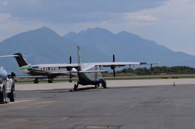 Fairchild Dornier 228 (N169CA) - A very rare and unique aircraft. A Dornier airborne observatory for Arizona. Challenger (N578FX) in the background. br /Now no longer the National Airline aircraft. br /Best viewed in full.