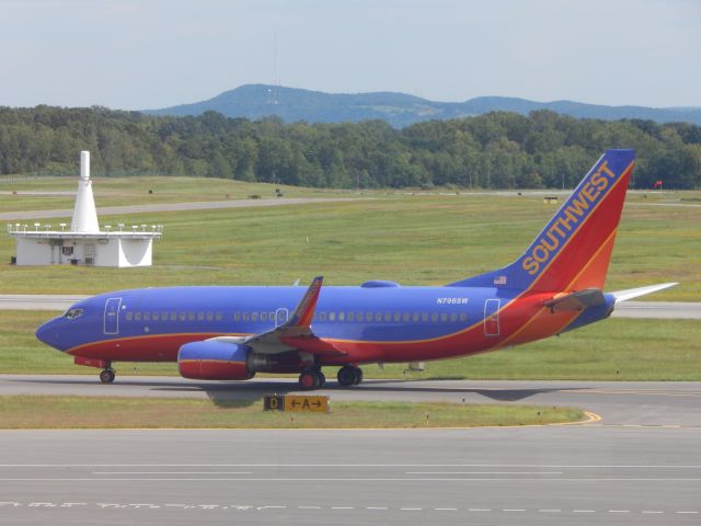 Boeing 737-700 (N796SW) - A Southwest Boeing 737-700 taxis down the runway at Albany.