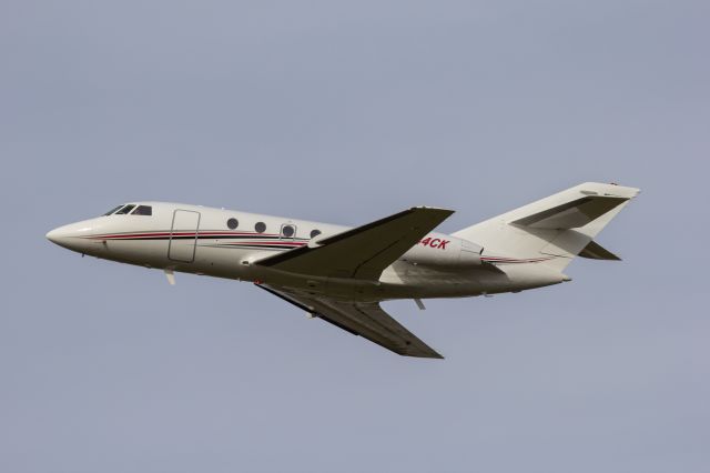 Dassault Falcon 20 (N244CK) - Kalitta Air's "new" Falcon 20 wearing the new registration 244CK (Formally 887DR) taking off Runway 23 for a maintenance test flight after sitting in maintenance for over a year.