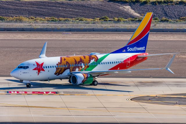 Boeing 737-700 (N943WN) - A Southwest 737-700 in California One special livery taxiing at PHX on 2/12/23 during the Super Bowl rush. Taken with a Canon R7 and Canon EF 100-400 II L lens.