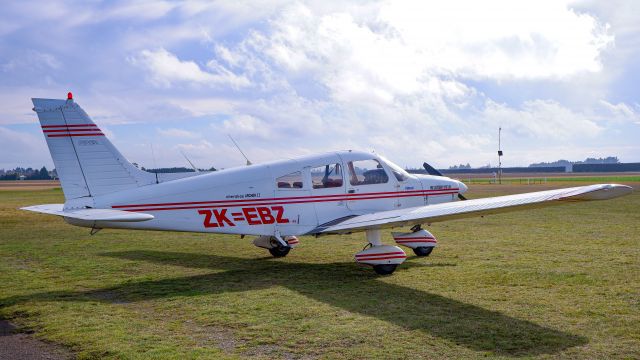 Piper Cherokee (ZK-EBZ) - At the aeroclub facing towards runway 02/20