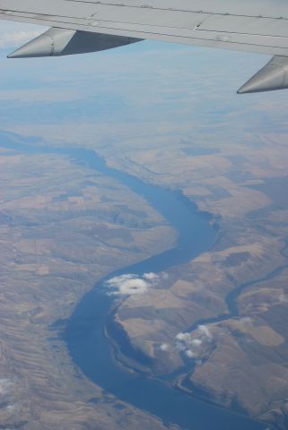 Boeing 737-700 — - Flying over the Columbia River between Washington State and Oregon