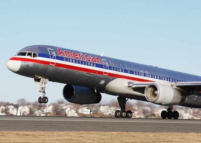 Boeing 757-200 (N697AN) - Silver bird rotating off of a RWY27 launch !