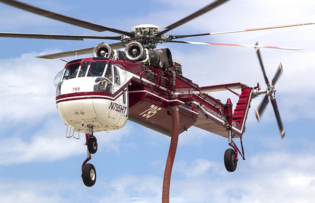 Sikorsky CH-54 Tarhe (N795HT) - Sikorsky S-64 Firefighting Skycrane - This in just one of four Skycranes battling the Carpenter 1 Fire outside Las Vegas. A lightning strike started the blaze in the Carpenter Canyon area on the western side of the mountain July 1. As of Sunday afternoon (07/14/13), the Carpenter 1 fire had charred 27,881 acres or roughly 43 square miles. Approx. 1,000 firefighters are battling the blaze, which is 70 percent contained.