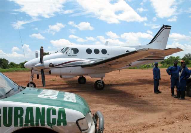 Beechcraft King Air 90 (ZS-OAE) - At a dirt strip near Beira, Mozambique.