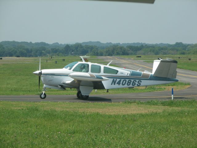 Beechcraft 35 Bonanza (N4086S) - at Queen City on the new taxi way to Rwy25.