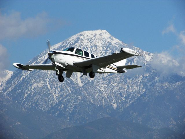 Beechcraft Bonanza (36) (N523C) - Taking off RWY 26L