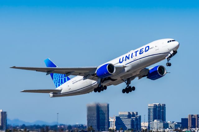 Boeing 777-200 (N777UA) - A United Airlines 777-200 taking off from PHX on 2/10/23 during the Super Bowl rush. Taken with a Canon R7 and Tamron 70-200 G2 lens.