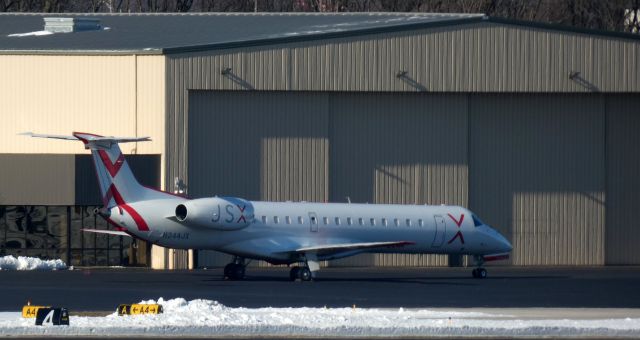 Embraer ERJ-145 (N244JX) - Catching some tarmac time is this 2000 Embraer EMB-145LR in the Winter of 2021.