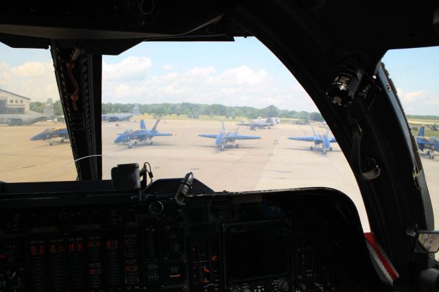 — — - The Blue Angels and an F-22 through the cockpit window of a B1B.