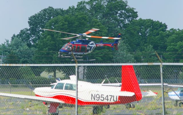 Bell 407 (N77NY) - LINDEN AIRPORT-LINDEN, NEW JERSEY, USA-JUNE 13, 2024: A news helicopter from one of the local New York City television stations is seen by RF taking off at approximately 1550 hrs.