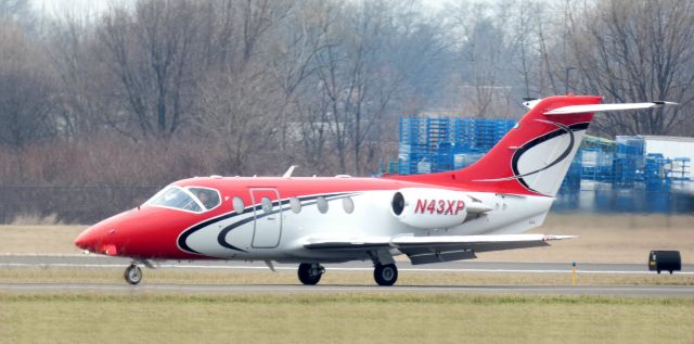 Beechcraft Beechjet (N43XP) - Taxiing to parking is this "Wheels Up Partner" 2007 Hawker Beechcraft Beechjet 400A in the Winter of 2023.