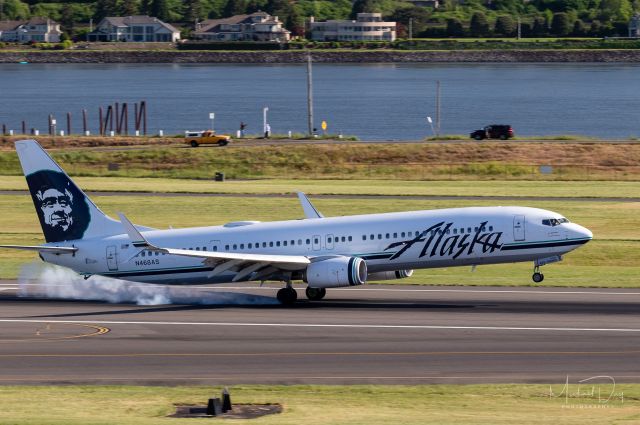 Boeing 737-900 (N468AS) - Waiting for the ANG Eagle flight to launch on hospital flybys and they had to wait for ASA 1201 from KSEA. Caught the puff of tire smoke just right!