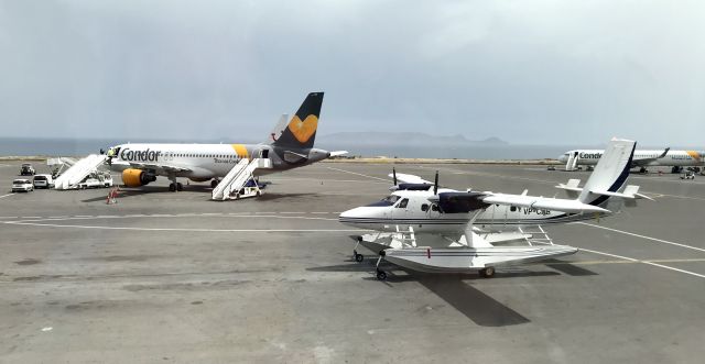 Beechcraft 19 Sport (VP-CHR) - Privately owned DeHavilland DHC-6-400 Twin Otter VP-CHR taxiing in on Heraklion Airport, Crete, Greece, seen from Gate A6 on 23d may 2019. 15 min later VP-CHP came in as well. Can't find exactly what VP stands for, probably lease/private owned? There seems to be a Aerospatiale Puma Helicopter with exactly the same tail code....