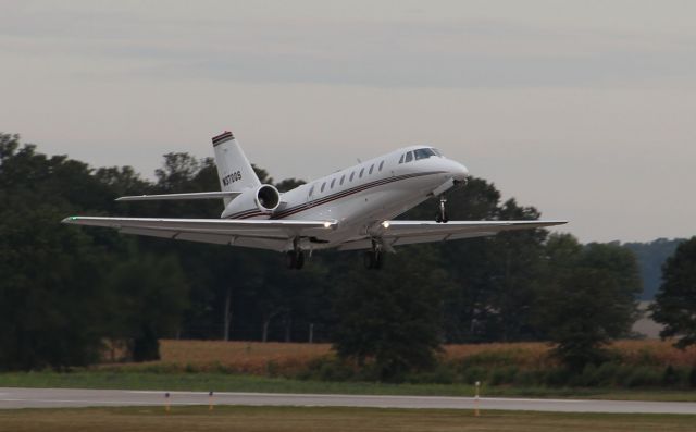 Cessna Citation Sovereign (N370QS) - Departing rwy 09 on 8/29/2011