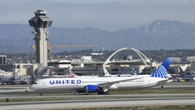 BOEING 787-10 Dreamliner (N14011) - Taxiing to gate after landing on 25L at LAX