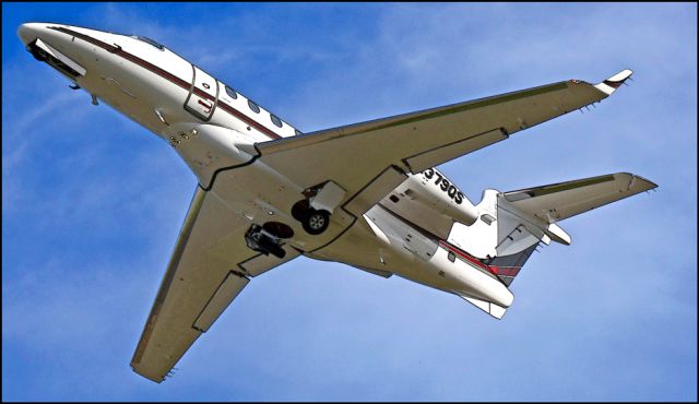 Embraer Phenom 300 (N379QS) - Departing the Merced Regional Airport