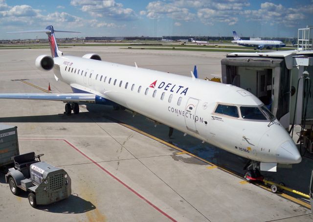 Canadair Regional Jet CRJ-900 (N186PQ) - Delta Connection (Pinnacle) CRJ-900LR at ORD on June 29, 2010.