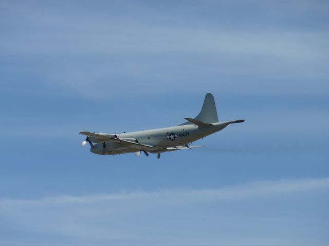 — — - Performing one of many touch and goes at Paine Field.