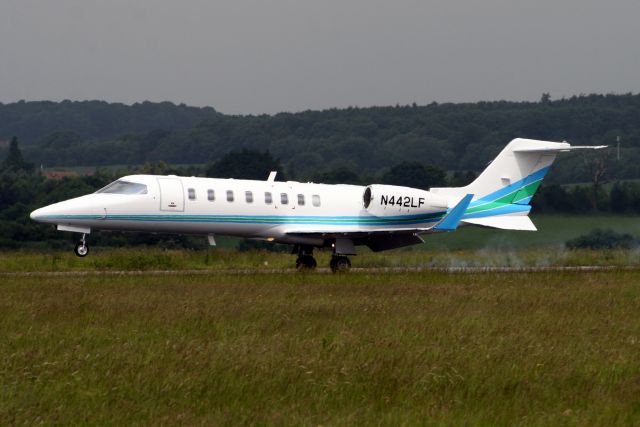 Learjet 45 (N442LF) - Touching down on rwy 26 on 6-Jun-08 arriving from BIKF.  Reregistered VT-CRA 24-Sep-08.