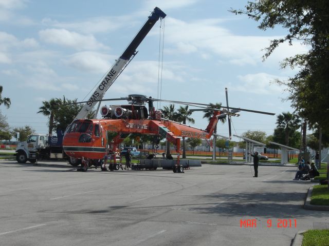 Sikorsky CH-54 Tarhe (N158AC) - S/N 64081 "Goliath" Erickson Air Crane Rotor removal before going into exhibition hall Heli Expo 2011 Orange County Convention Center Orlando, Florida