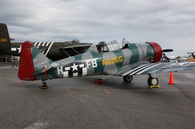 Grumman AA-5 Tiger (N826G) - North American AT-6 on static display at the 2012 Florida International Airshow