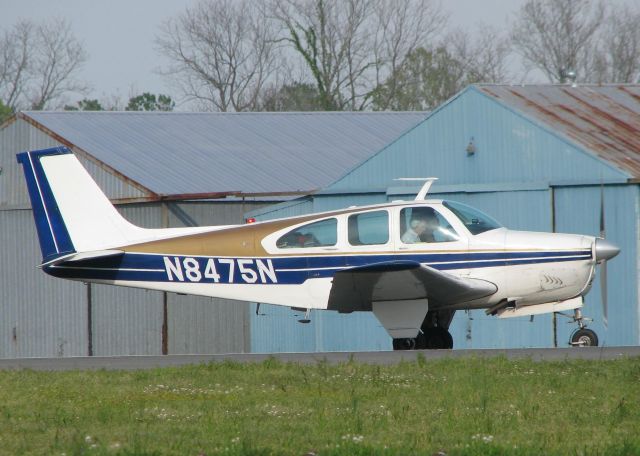 Beechcraft Bonanza (33) (N8475N) - Rolling on 14 for take off from the Shreveport Downtown airport.