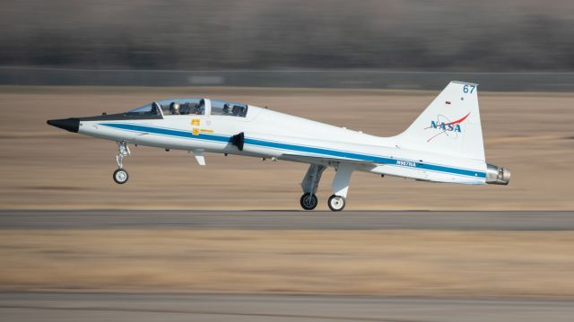 Northrop T-38 Talon (N967NA) - NASA T-38N touching down. For you Georgia Tech fans, that's a GT helmet in the front.