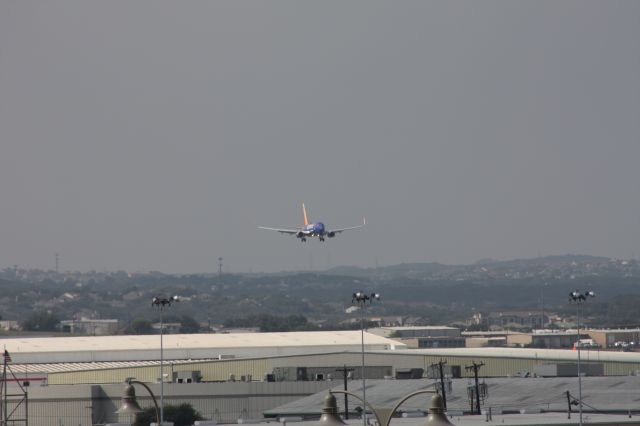 Boeing 737-700 (N421LV) - Taken atop the long-term parking garage. Was not expecting to see the new Heart livery from Southwest! Nice surprise!