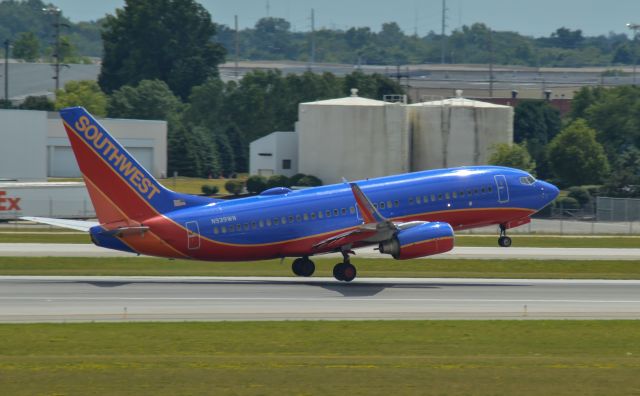 Boeing 737-700 (N939WN) - Taken from KCMH parking garage, picture is of a departure to the west.